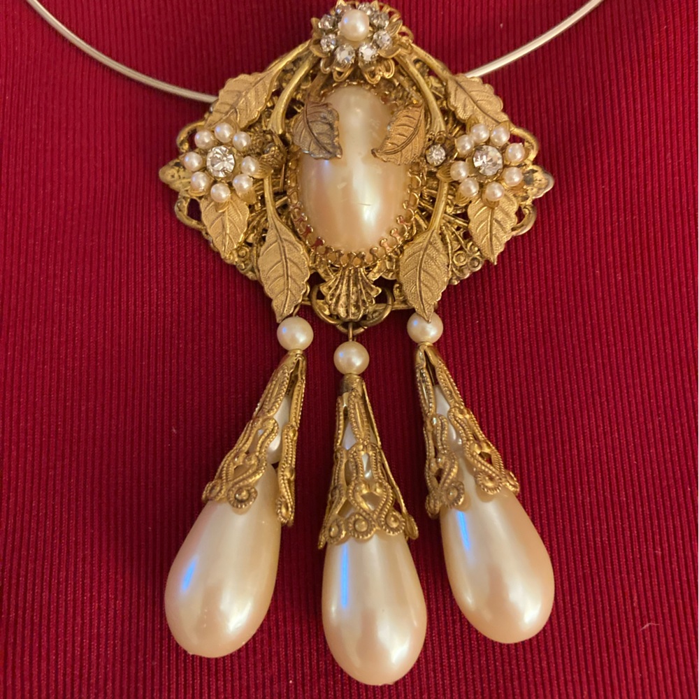 Vintage, Pendant, 3 1/2 “ long and 2 1/2 inches wide. Gold finish. 1980’s